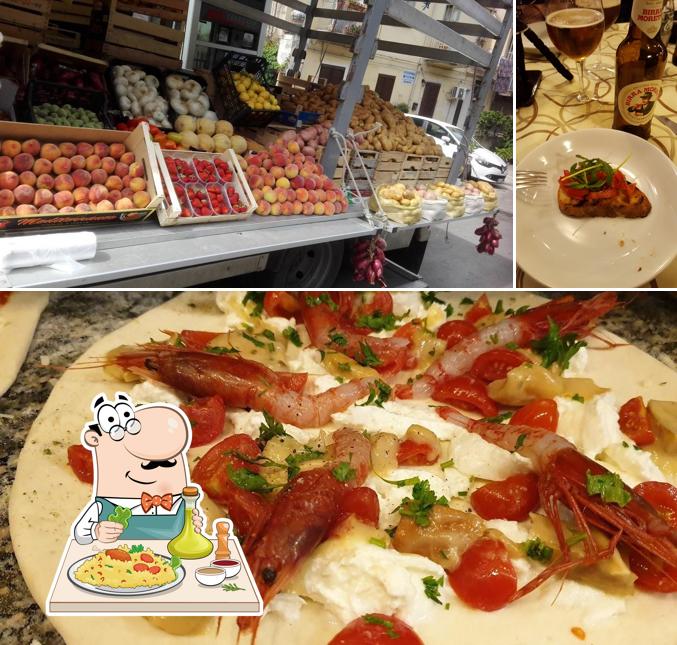 La foto di cibo e birra da Pizzeria al Girotondo