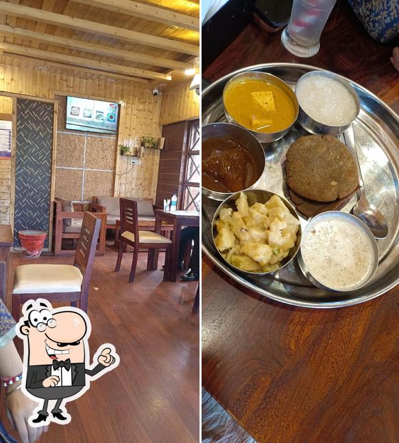 Take a seat at one of the tables at ESPATO - My Learn Coffee, Pure Veg Restaurant in Channi Himmat, Jammu