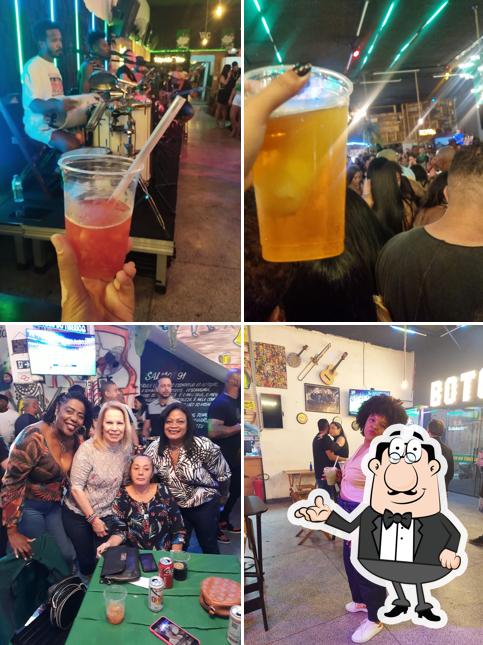 Entre diversos coisas, interior e comida podem ser encontrados no Boteco do Tibério