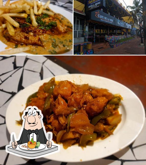 This is the image showing food and interior at Cafe De La Mer