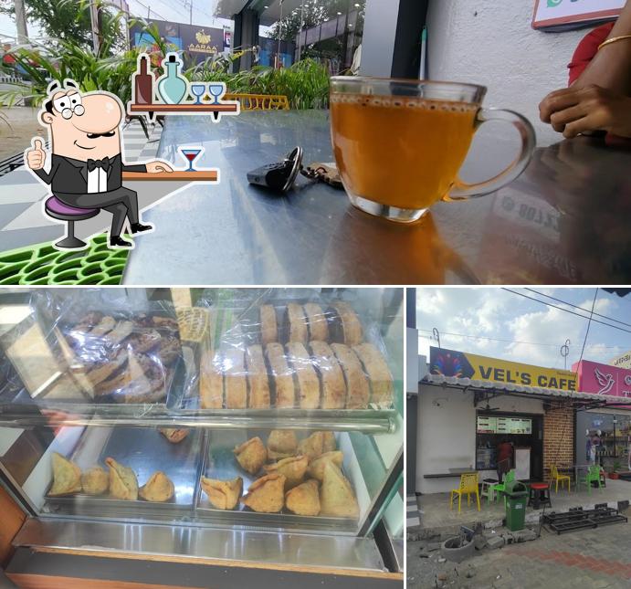 Check out the image displaying interior and beverage at Vels cafe