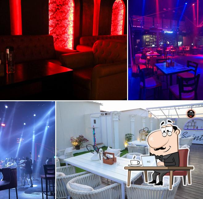 Take a seat at one of the tables at Afterlyf - Club & Lounge