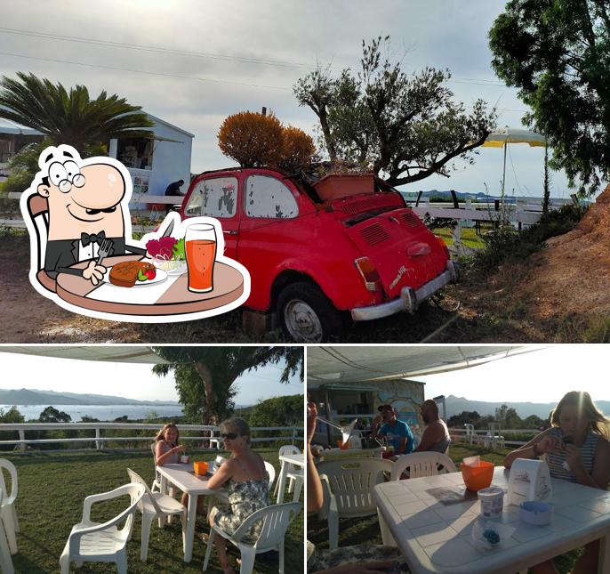 One Baja Sardinia si caratterizza per la tavolo da pranzo e esterno