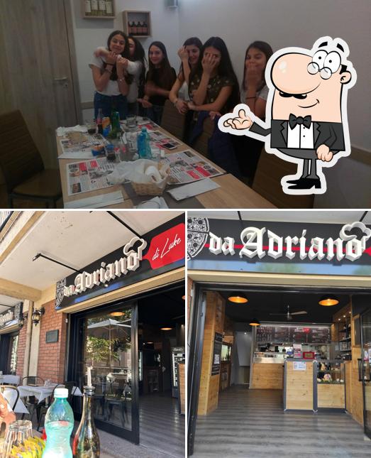 Questa è la foto che mostra la interni e bevanda di da Adriano