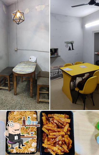 Check out the image displaying interior and food at Everest Momos & More