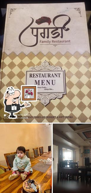Take a seat at one of the tables at Pagdi Restaurant