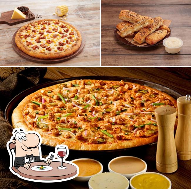 The photo of Pizza's By Dhuaan’s food and beverage