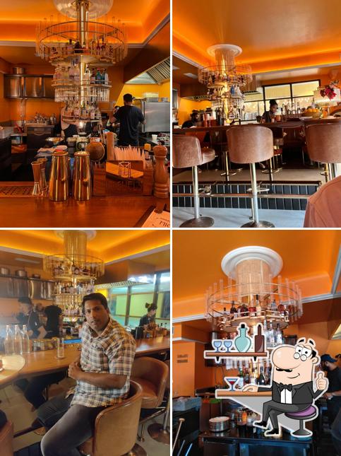 Take a seat at one of the tables at Miguel's - Cocktails & Petiscos