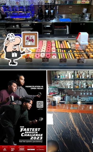 Dai un'occhiata agli interni di Mister Coffees