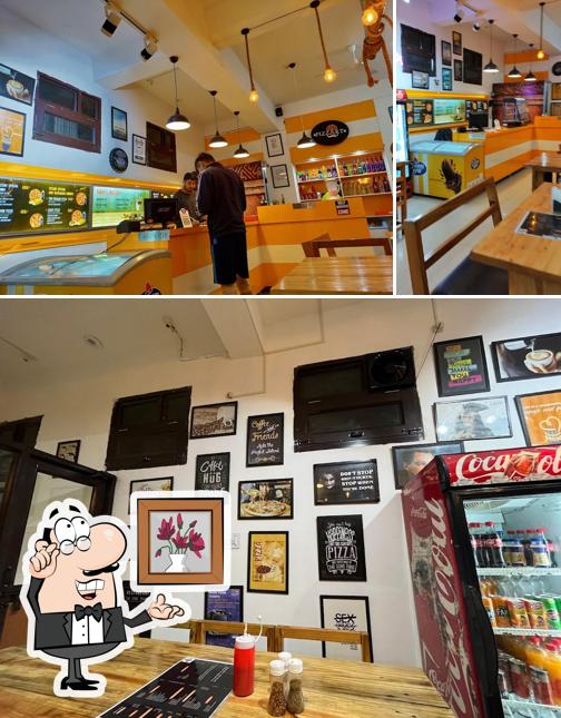 The interior of Pizzart - Mafia Cafe