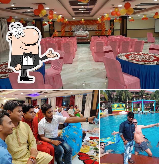 Take a seat at one of the tables at Mewar Restaurant