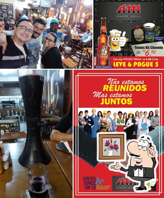 Veja imagens do interior do AM CHOPP GRILL