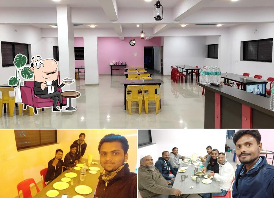 Take a seat at one of the tables at Hotel Dosti Palace