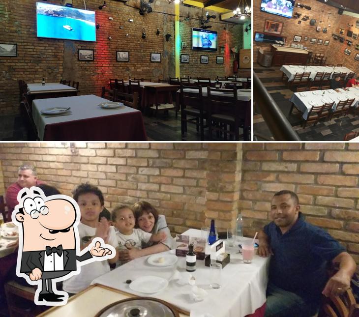 O interior do Pizzaria Dei Cugini