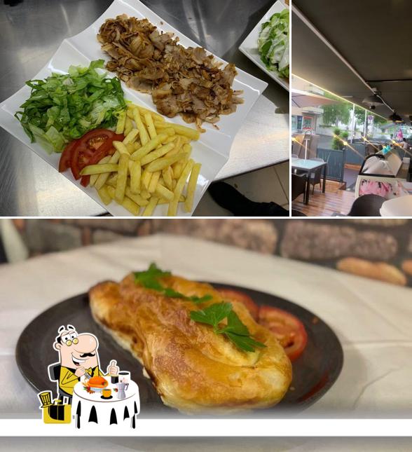 Tra le varie cose da Bistro Besa Restaurant si possono trovare la cibo e interni