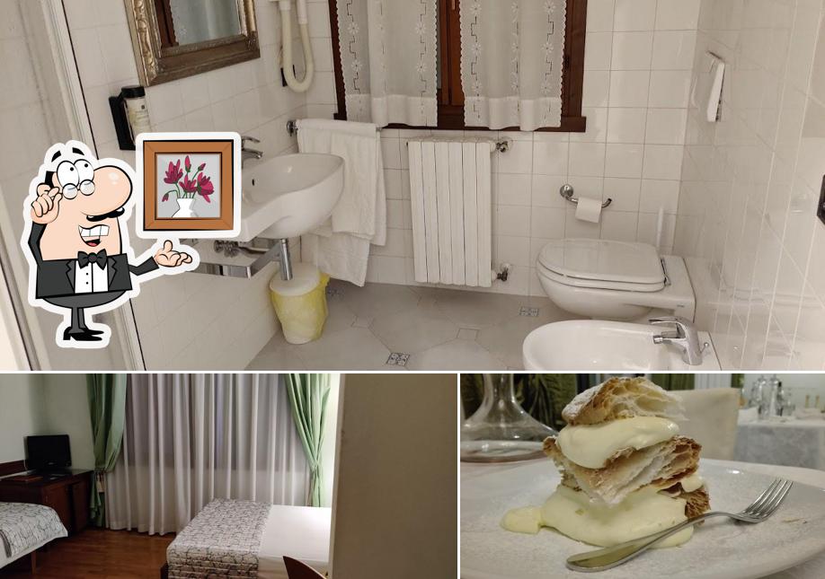 Questa è la immagine che presenta la interni e cibo di Hotel alla Busa