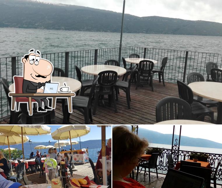 Siediti a un tavolo di Ristorante Pizzeria al Lago