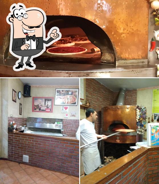 Dai un'occhiata agli interni di La Bottega della Pizza