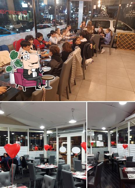 Dai un'occhiata agli interni di La Divina Pizzeria Braceria