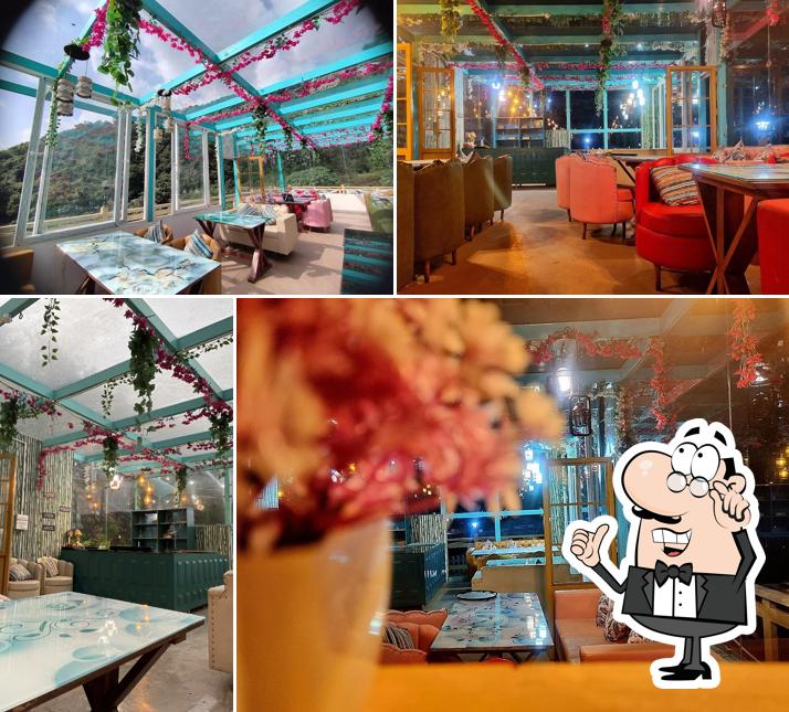 Take a seat at one of the tables at Feelings Cafe