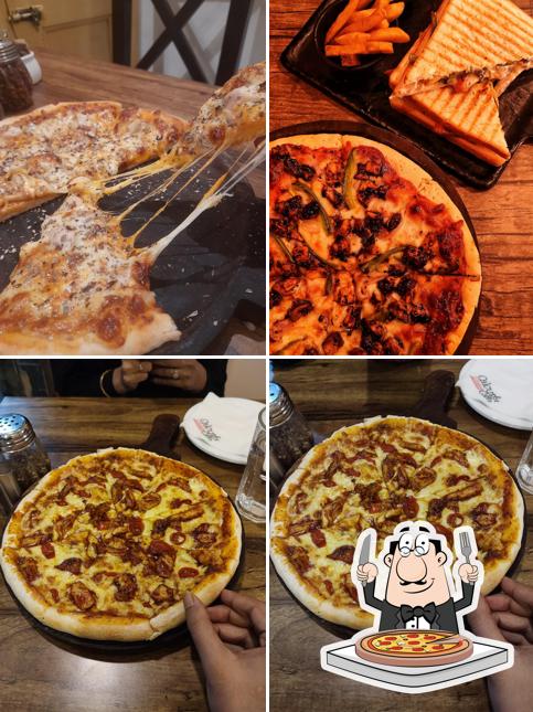 Get pizza at Calcutta Bakery Cafe Baghajatin