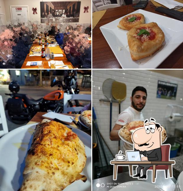 Dai un'occhiata agli interni di Pizzeria Al Solito Posto