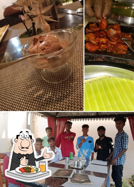 Take a look at the picture depicting food and interior at Grand Park Restaurant