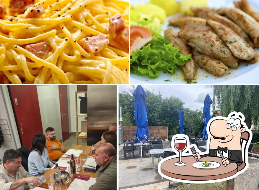 La immagine di cibo e interni da Restaurant Pizzeria Le Grillon