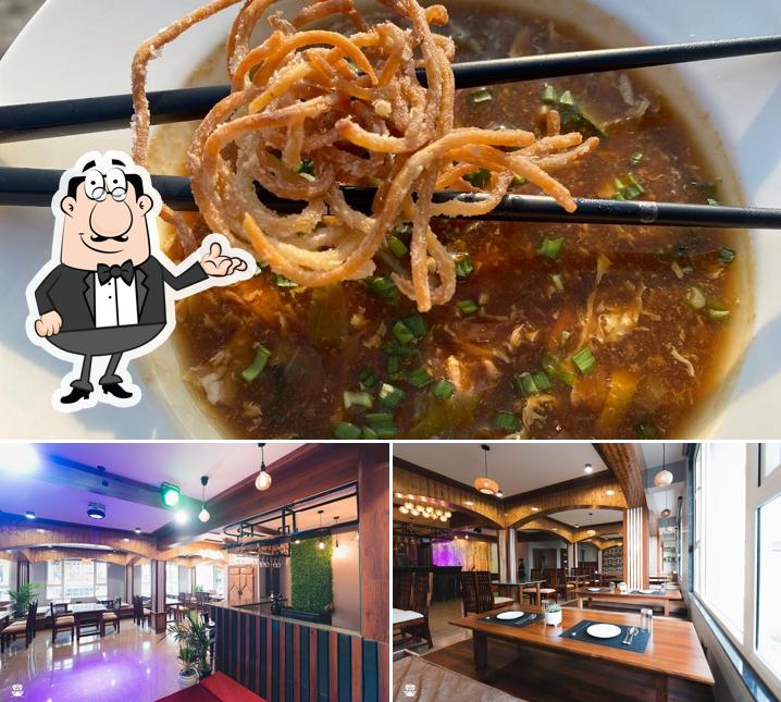 Check out the photo showing interior and food at DILISA by the purple hour