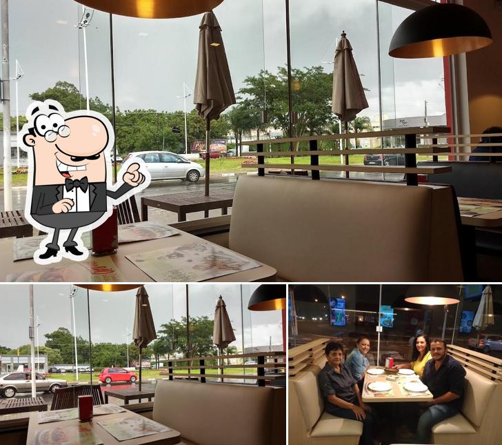 Sente em uma das mesas no Habib's Atibaia