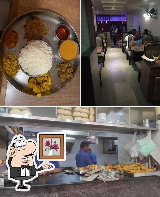 Take a seat at one of the tables at Kalika Bar & Restaurant