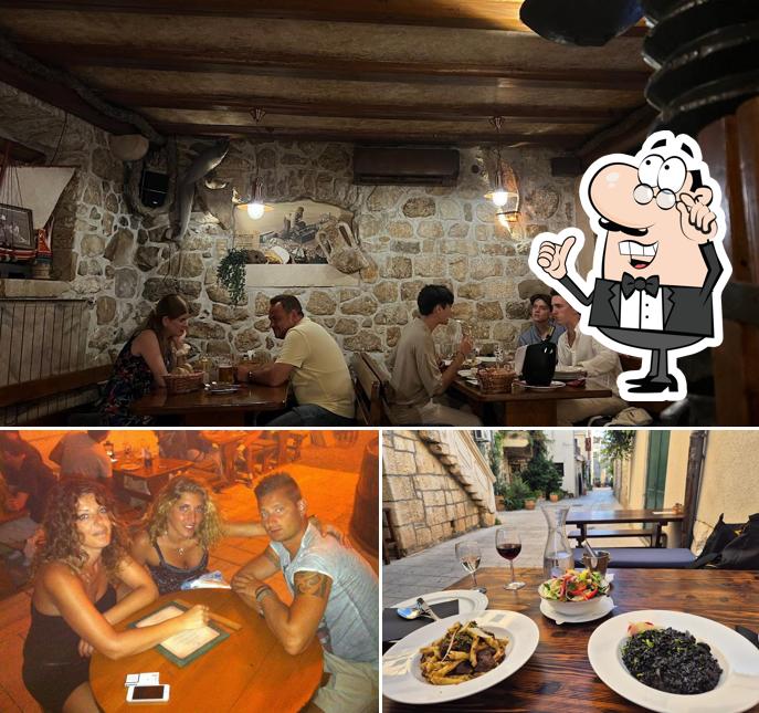 Dai un'occhiata agli interni di Tavern Kalalarga