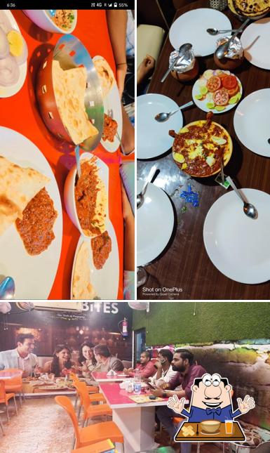 The photo of food and interior at One Bites Restaurant
