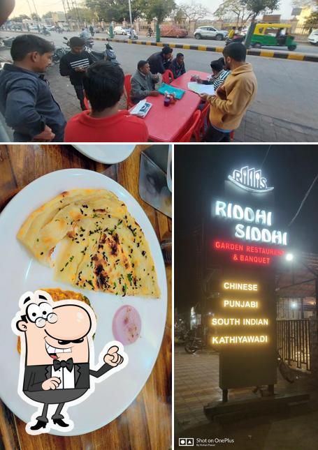 Check out the picture depicting exterior and interior at Riddhi Siddhi (Garden Restaurant)