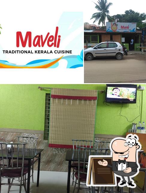 Among different things one can find exterior and interior at Maveli Restaurant