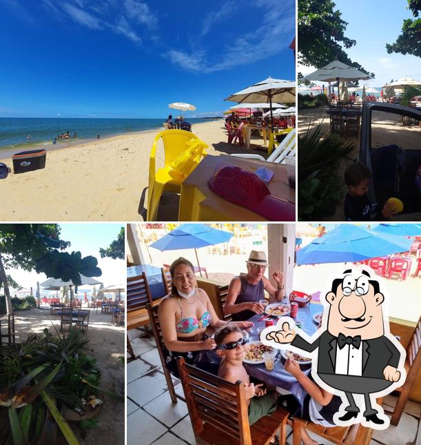 Sente em uma das mesas no Churrascaria e Restaurante Paulo Tchê