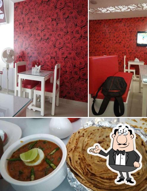 Check out the image depicting interior and food at Mom's Place