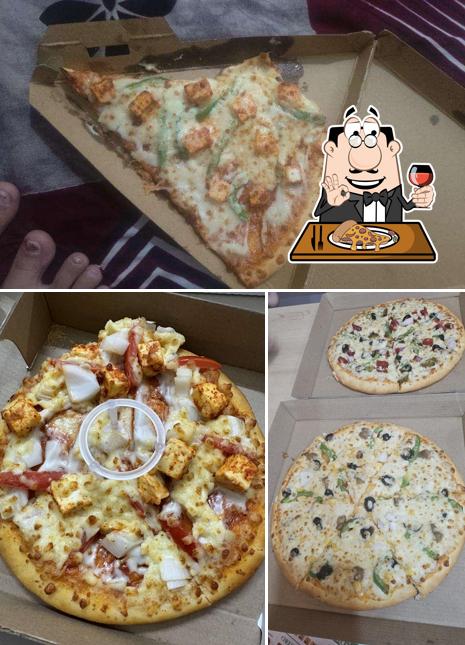 Pick pizza at La Milano Pizzeria