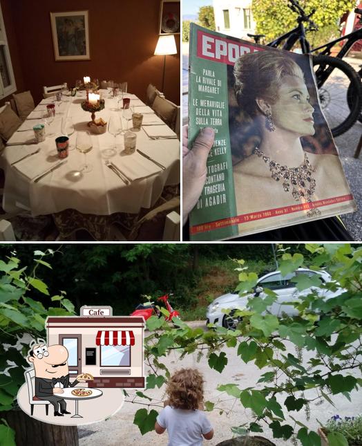 Guarda la immagine che presenta la esterno e tavolo da pranzo di Antica Osteria Santa Margherita