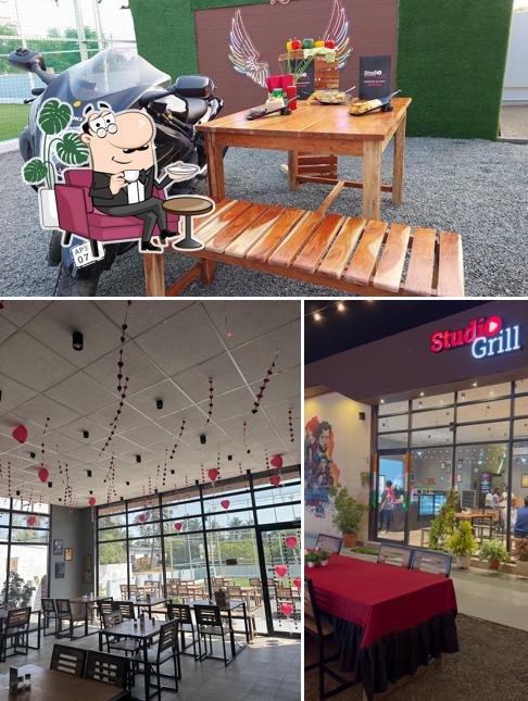 Take a seat at one of the tables at Studio Grill