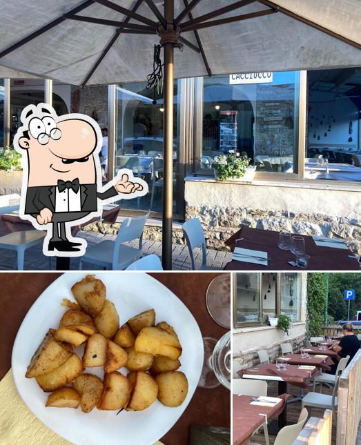 Questa è la foto che presenta la interni e cibo di Da Reno