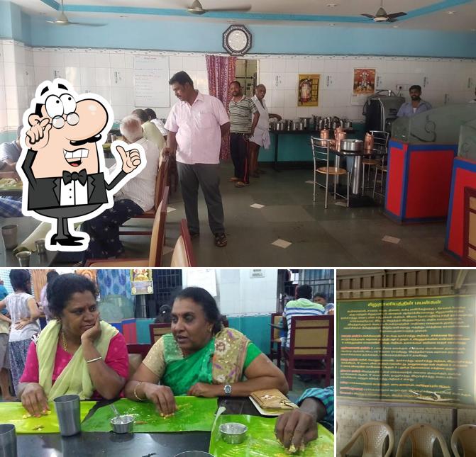 Take a seat at one of the tables at Sri Kumar Mess