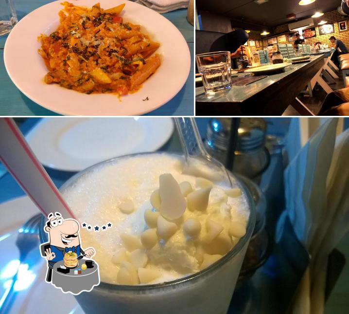 Check out the photo depicting food and bar counter at Tossin Pizza Galleria Market