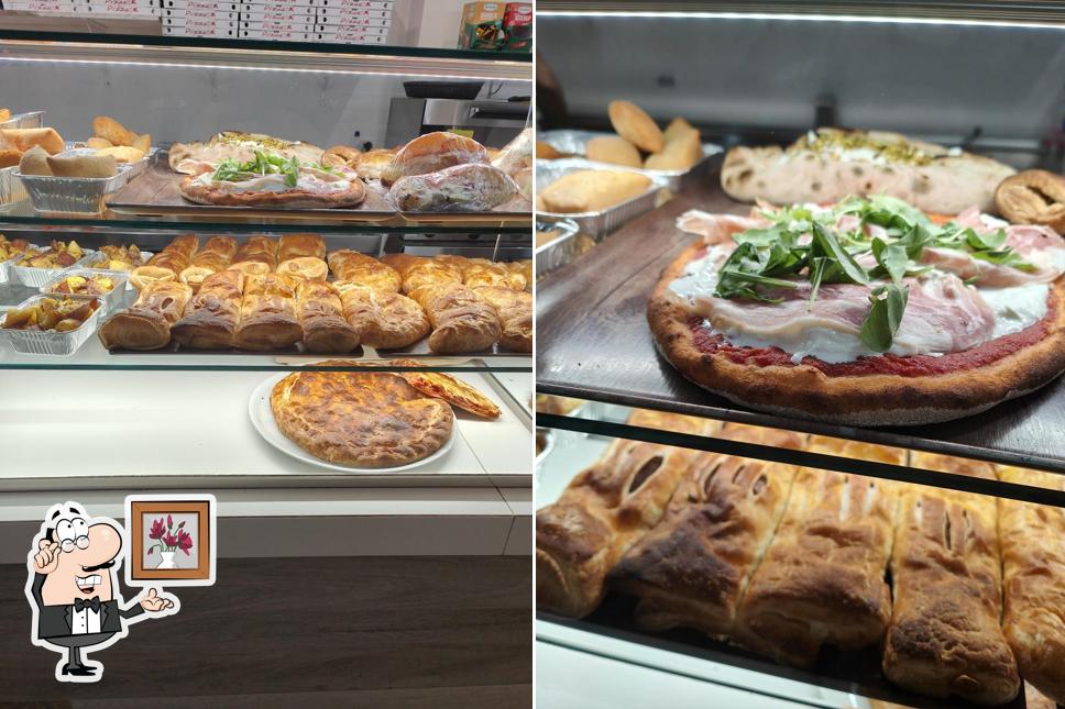 Dai un'occhiata agli interni di Degustami Enjoy Your Pizza