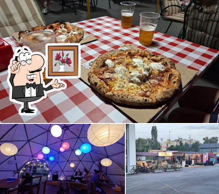 Dai un’occhiata alla foto che mostra la interni e esterno di Pizza Priksa