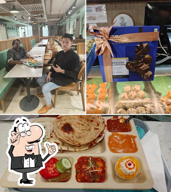Take a look at the photo displaying interior and food at Haldiram's - Noida Sector- 63