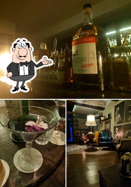 La foto della interni e alcol di Cotton Club Speakeasy