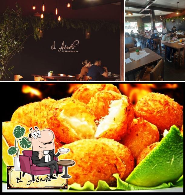 Esta é a foto ilustrando interior e comida no El Asador Restaurante
