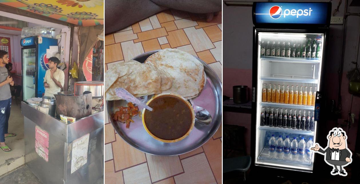 Take a seat at one of the tables at Gupta ji ke chole bhature bhandar