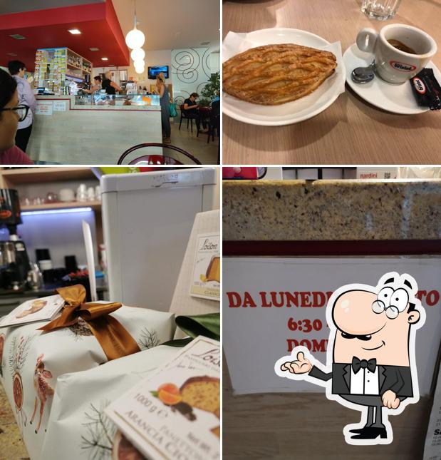 Dai un'occhiata agli interni di Romea Caffétteria
